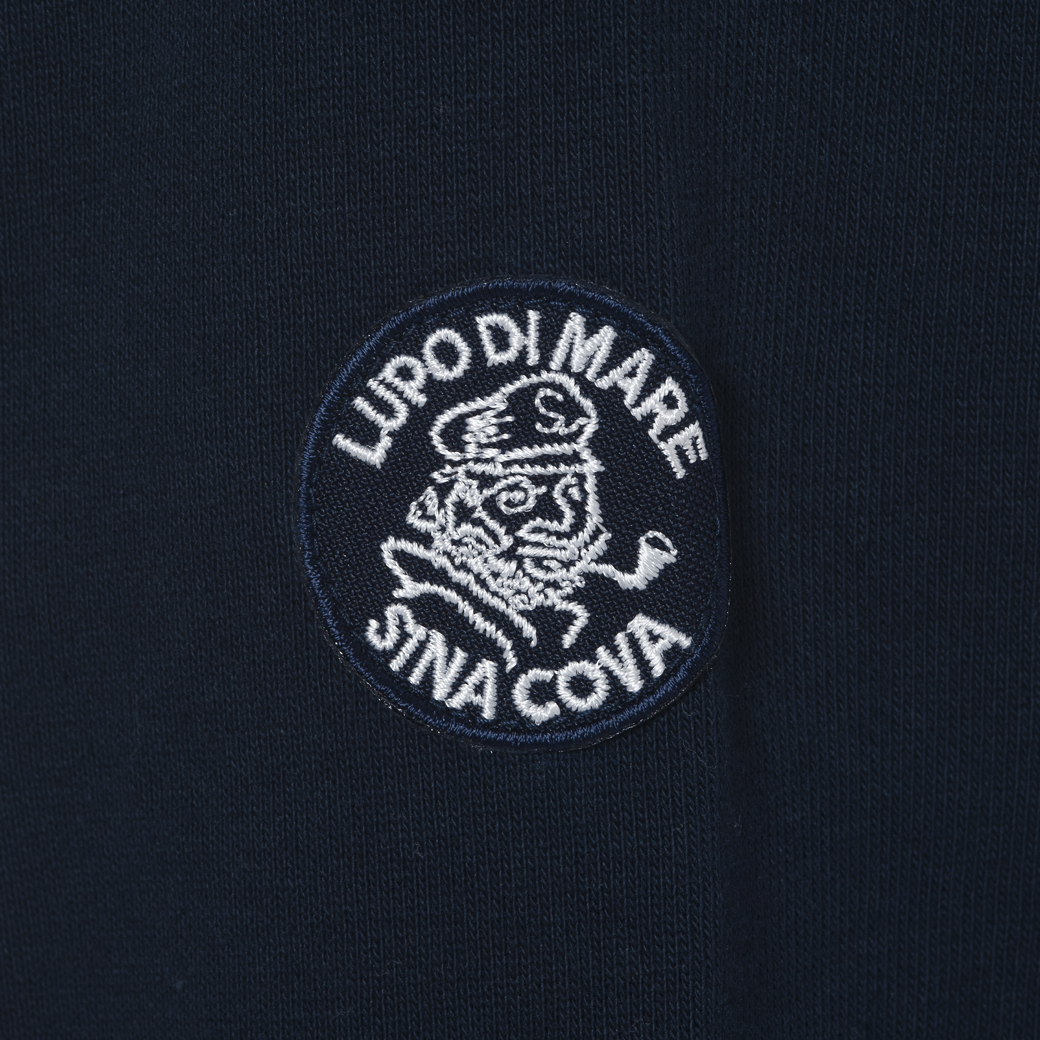 【公式】シナコバ （SINA COVA） ZIPUPプルオーバー 22210030 オフホワイトの小丸ワッペン